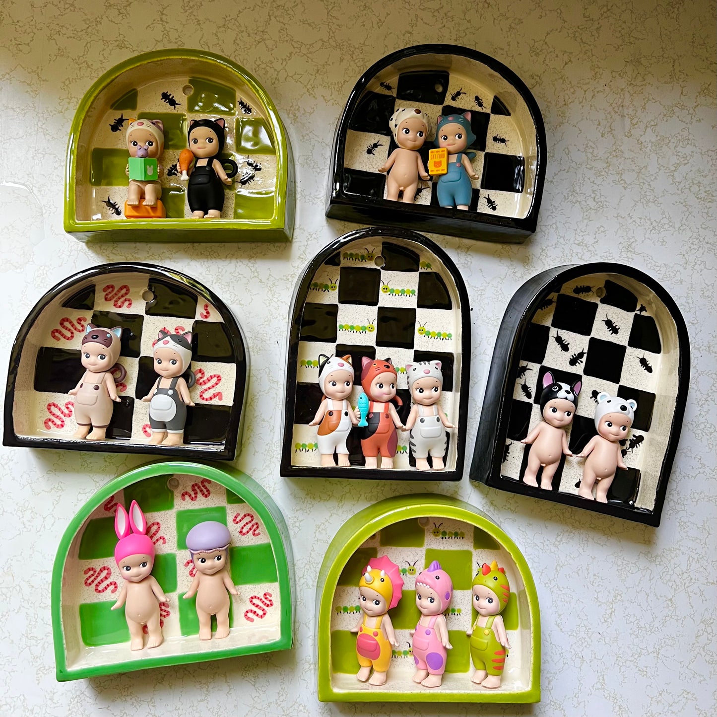 Ceramic ant trinket shelf
