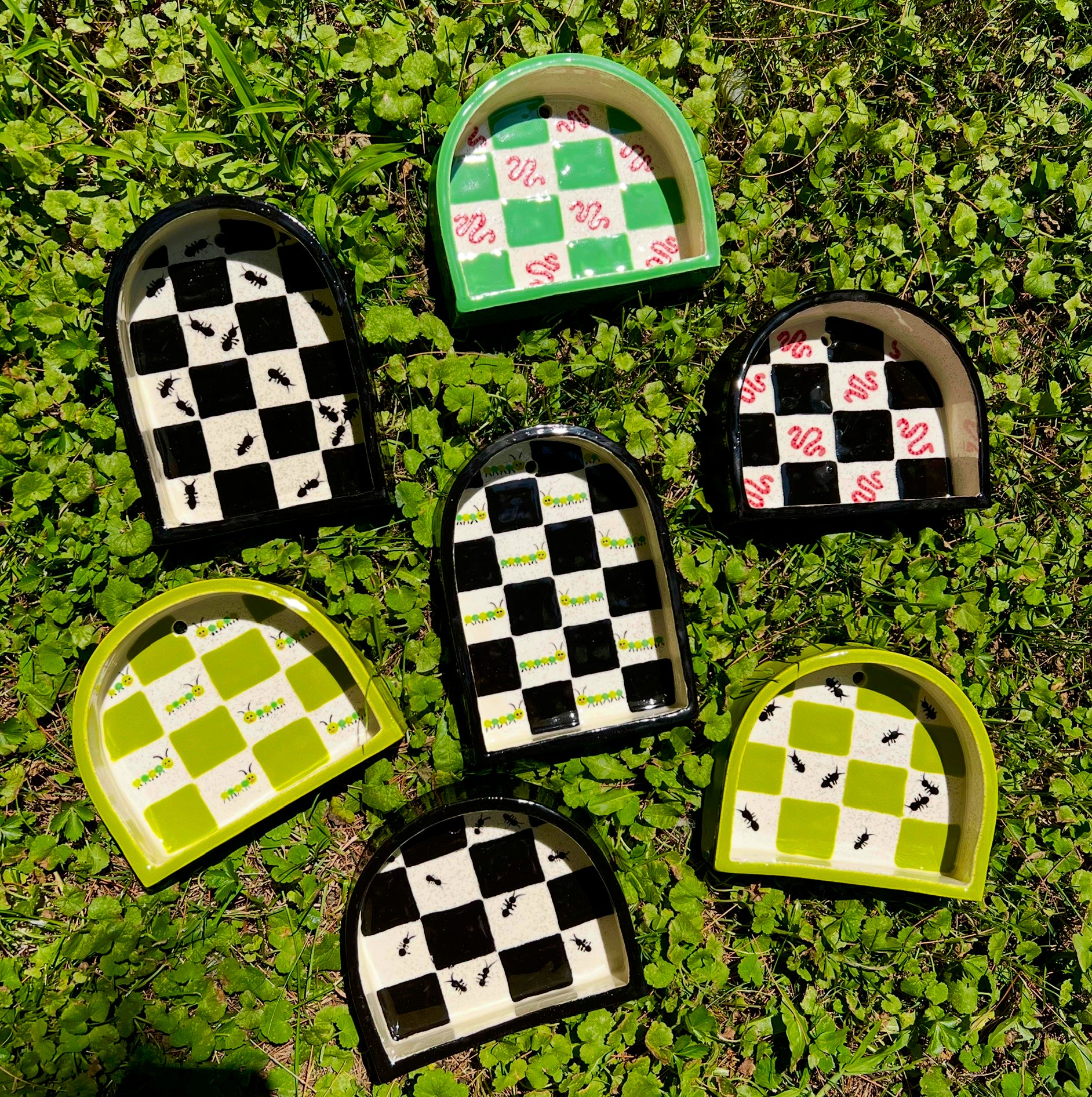 Ceramic ant trinket shelf