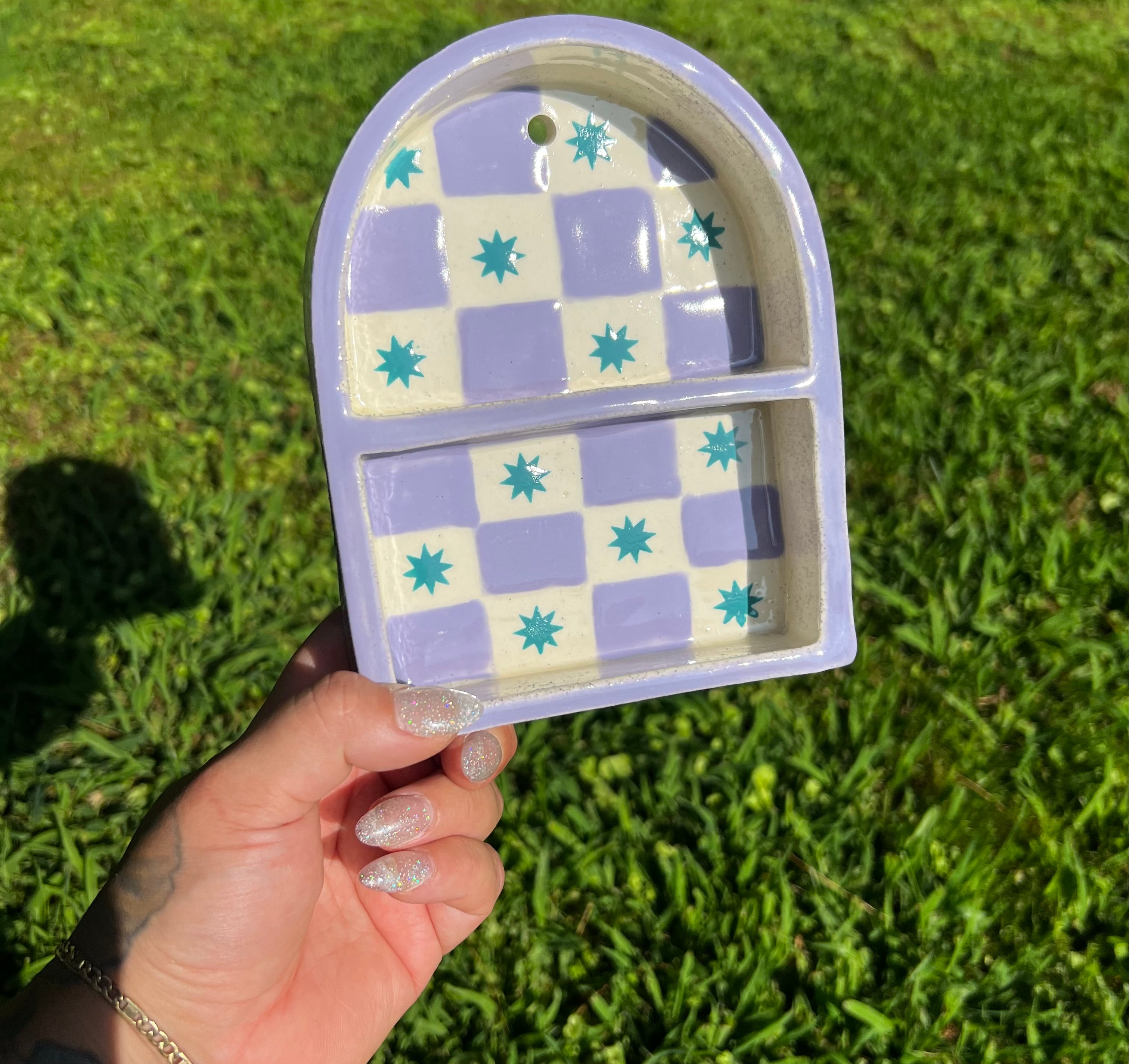 Ceramic ant trinket shelf