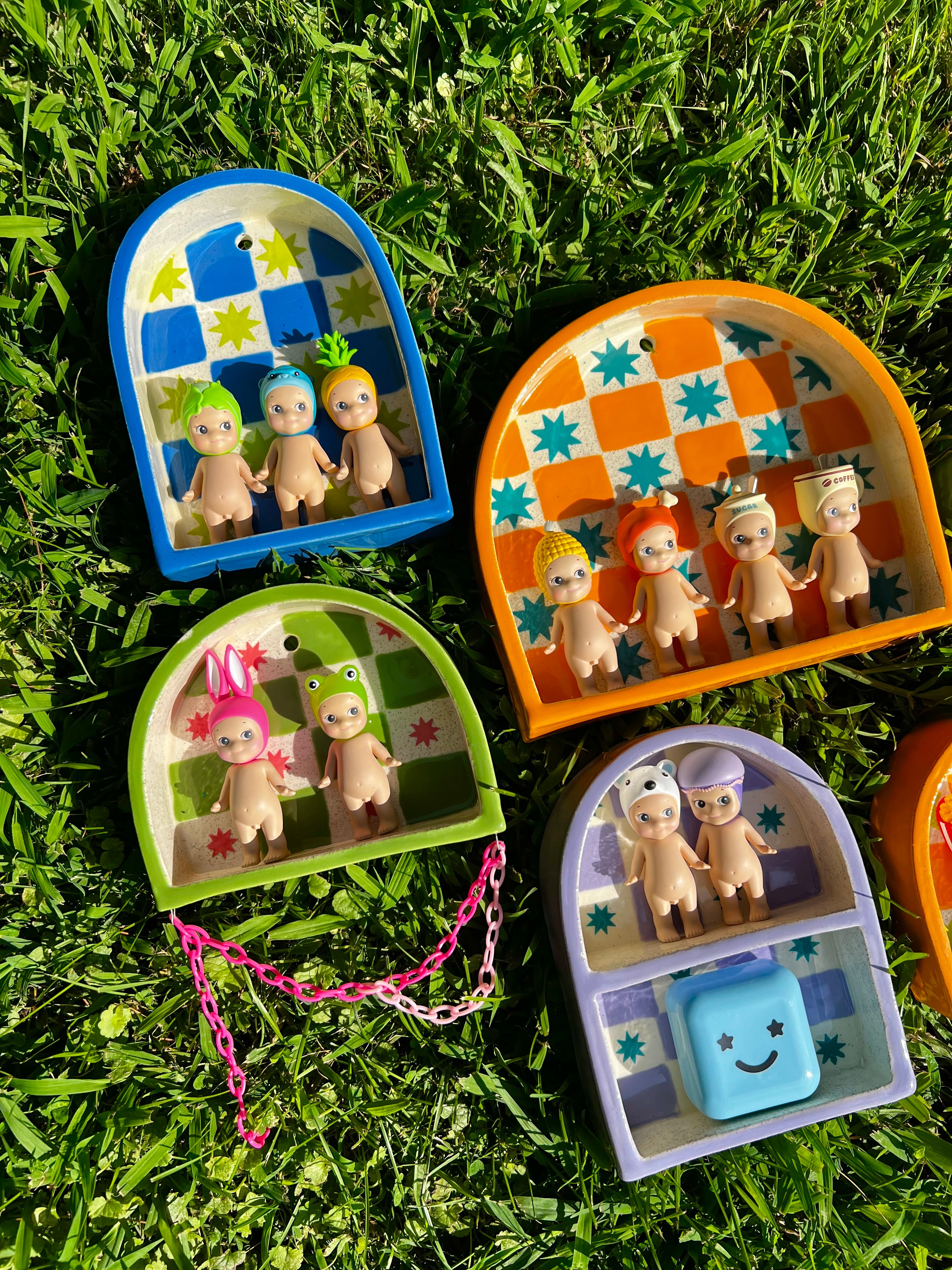 Ceramic ant trinket shelf