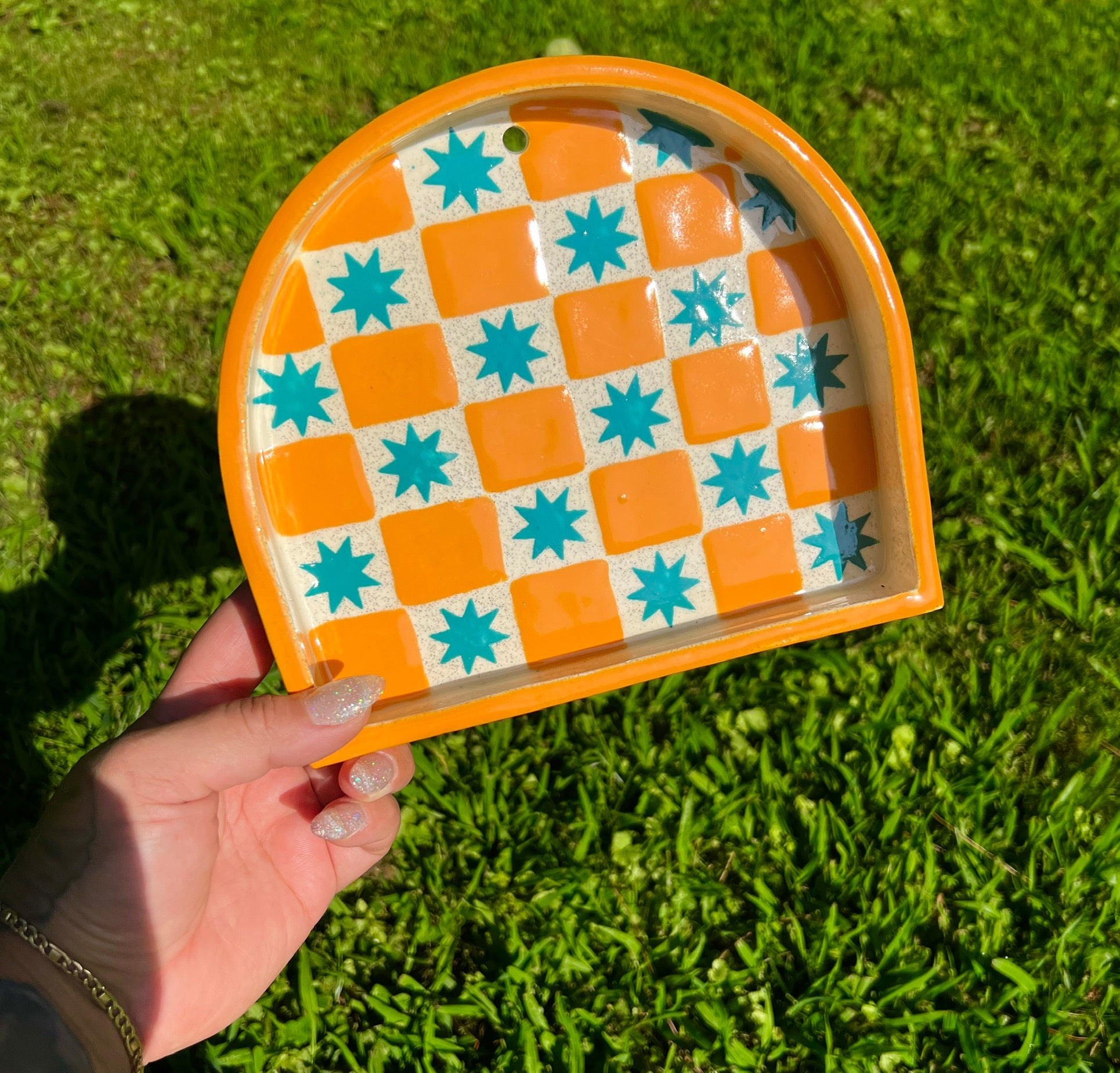 Ceramic ant trinket shelf