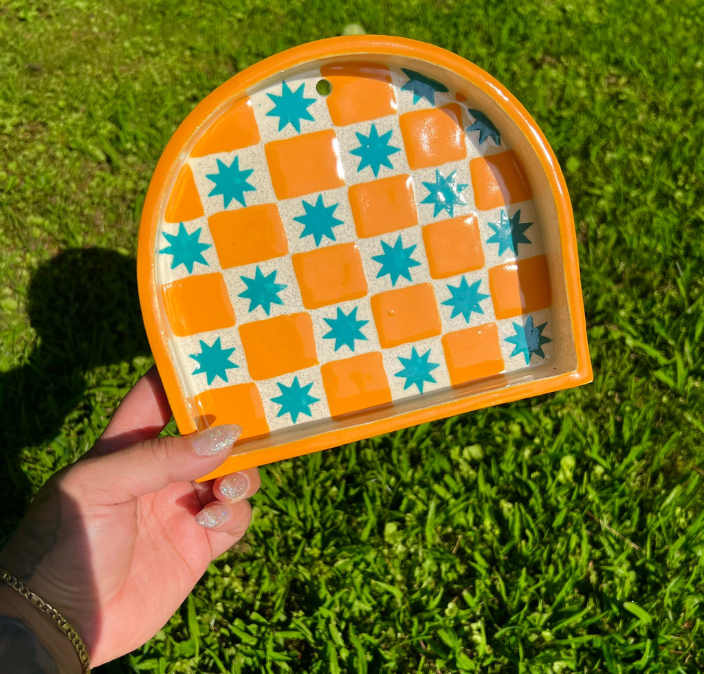 Ceramic ant trinket shelf