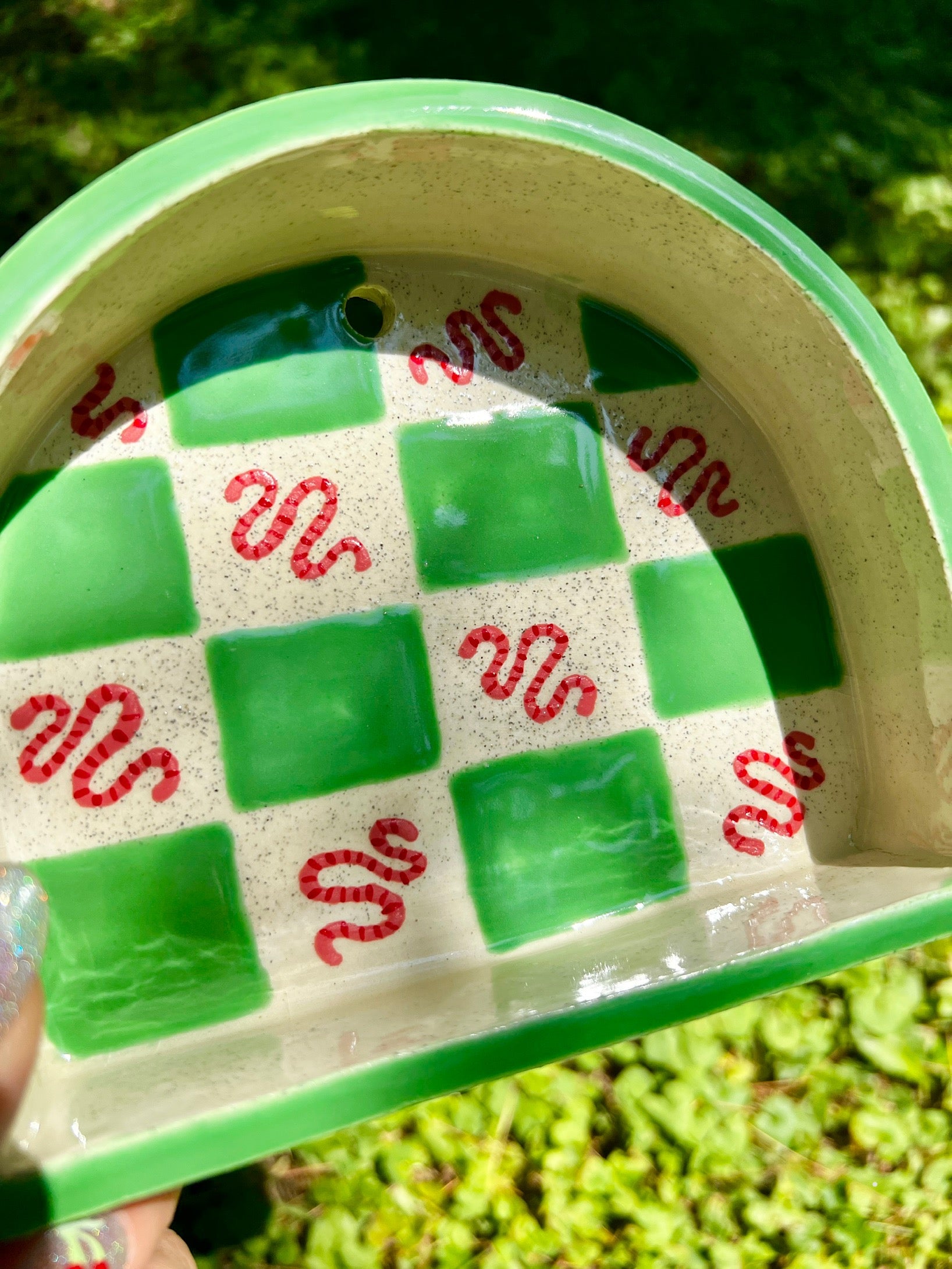 Ceramic worm trinket shelf