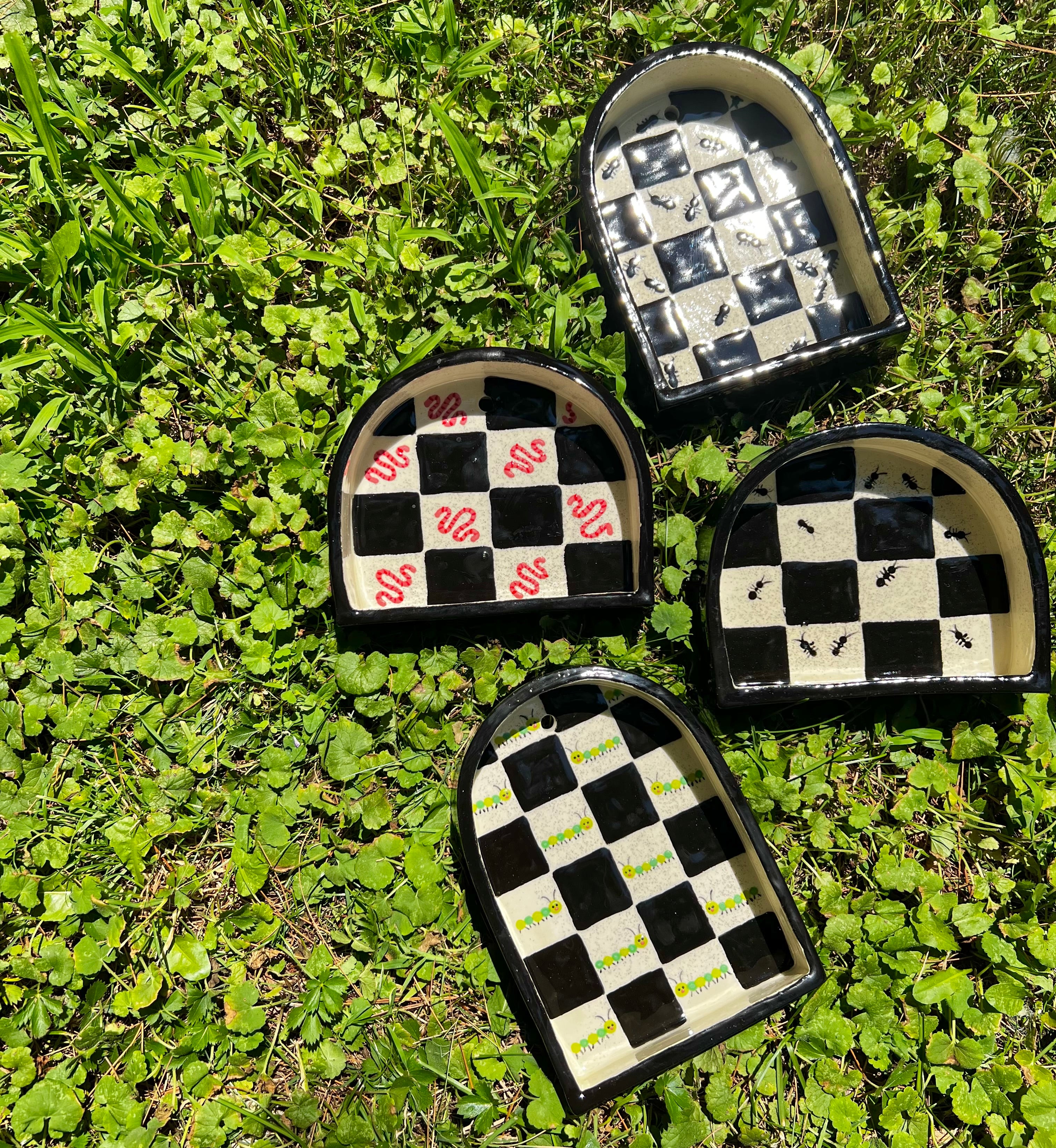 Ceramic caterpillar trinket shelf