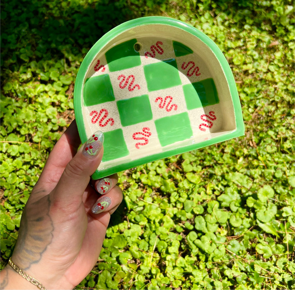 Ceramic worm trinket shelf