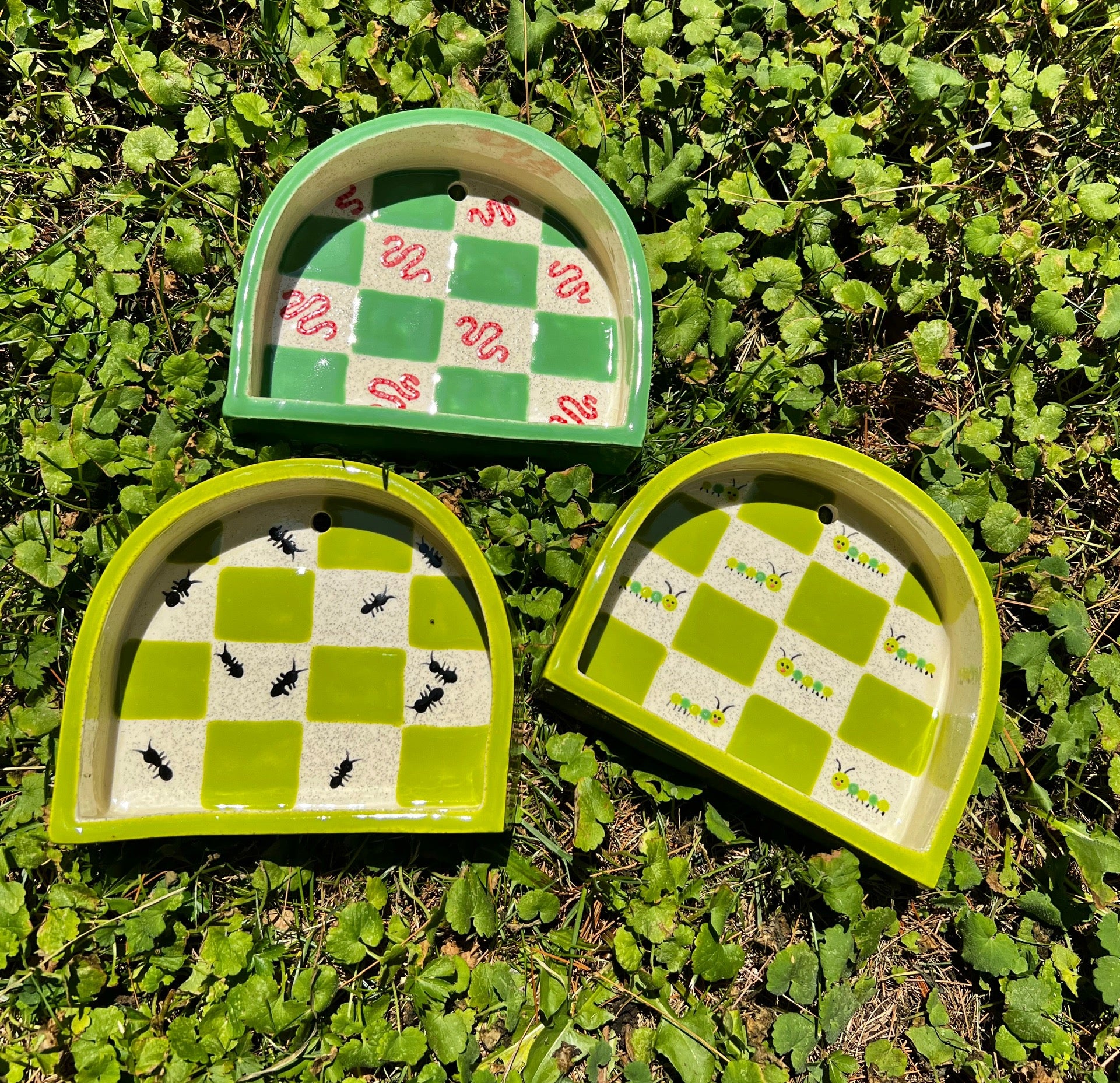 Ceramic ant trinket shelf