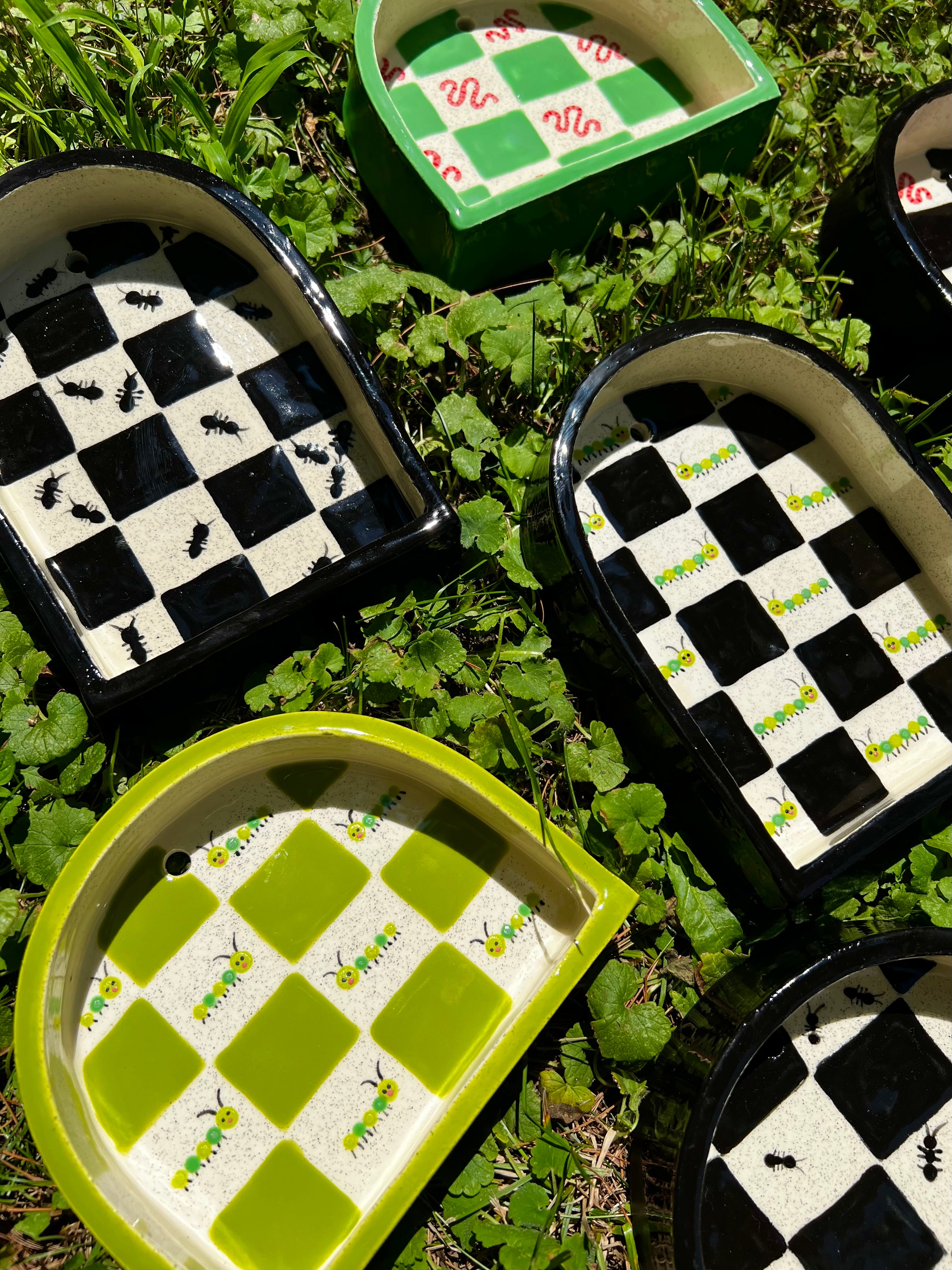 Ceramic caterpillar trinket shelf