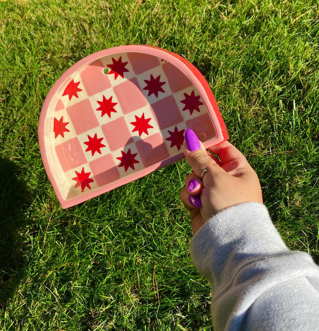 Ceramic ant trinket shelf