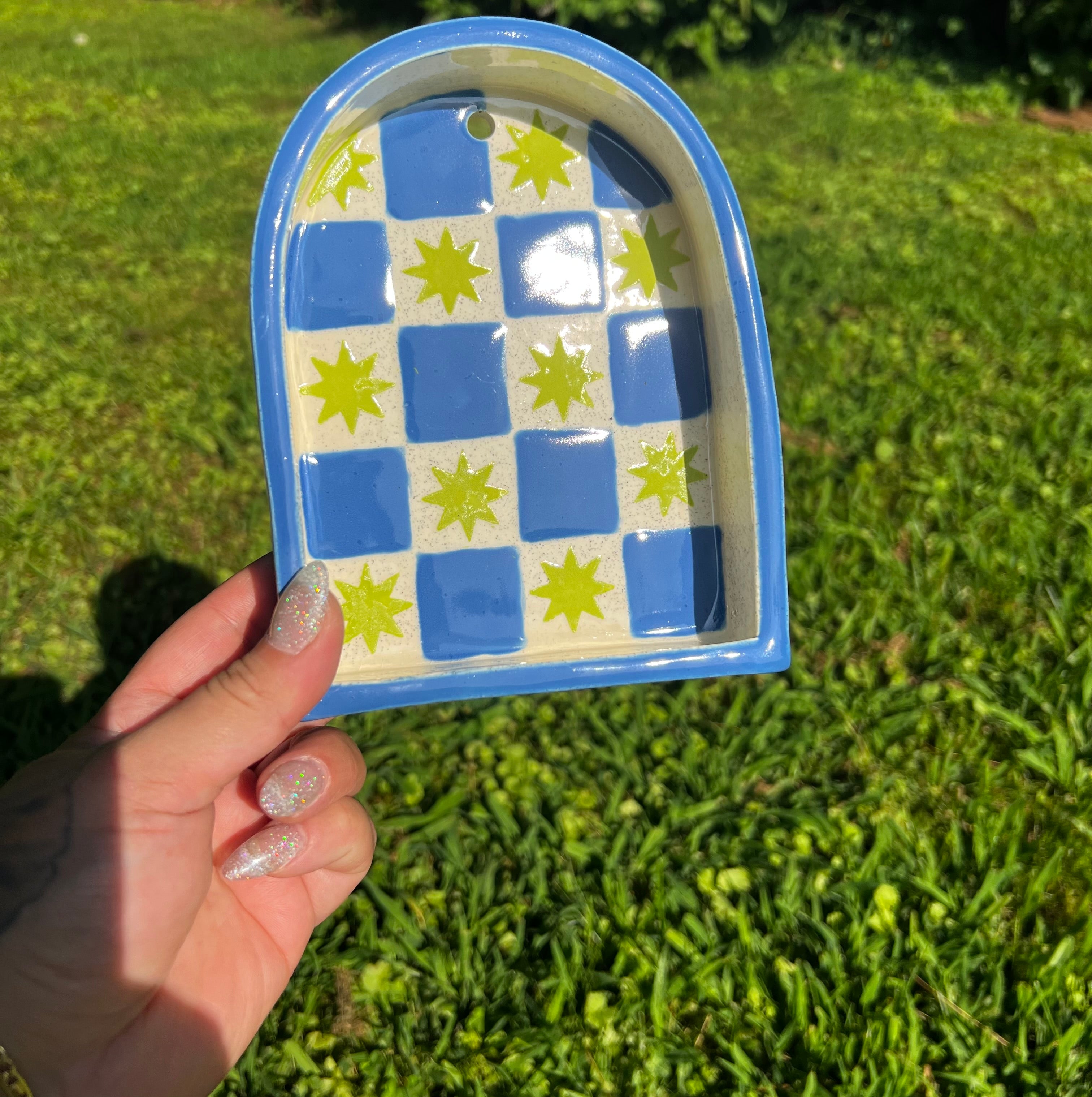 Ceramic ant trinket shelf